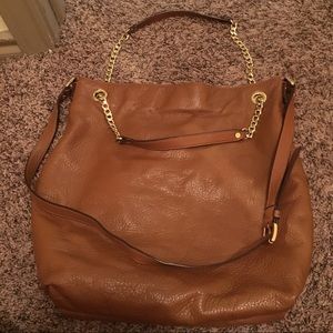 MK medium brown leather bag